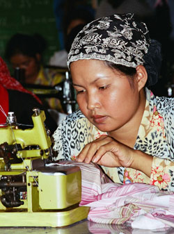 A woman attends a training programme provided by the ILO through a network pf mobile training units. This vocational training is helping to promotw better opportunities for women. Copyright ILO Photographer Cassidy K.