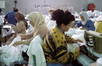 Women working in the tailoring workshop of a textile factory. Syria.